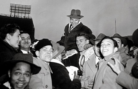 Cleveland players and fans celebrate with their coach.